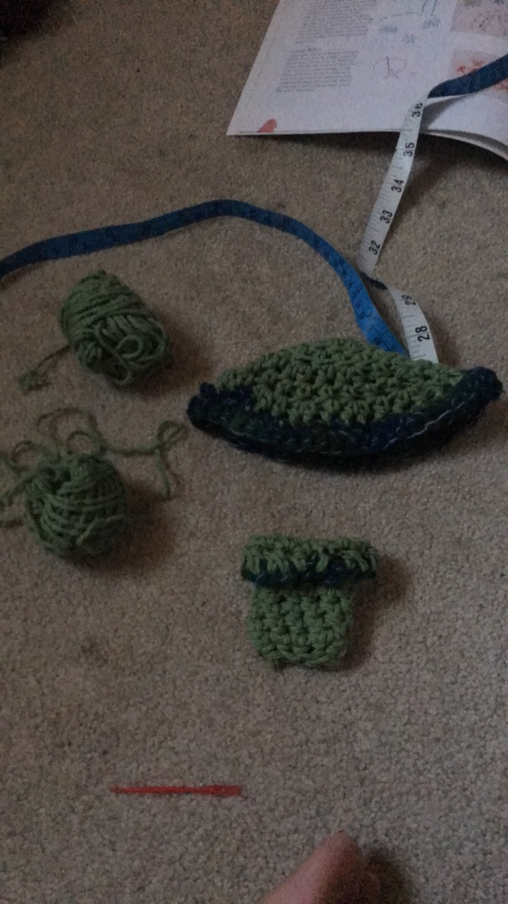 messed up green crochet beanie and socks